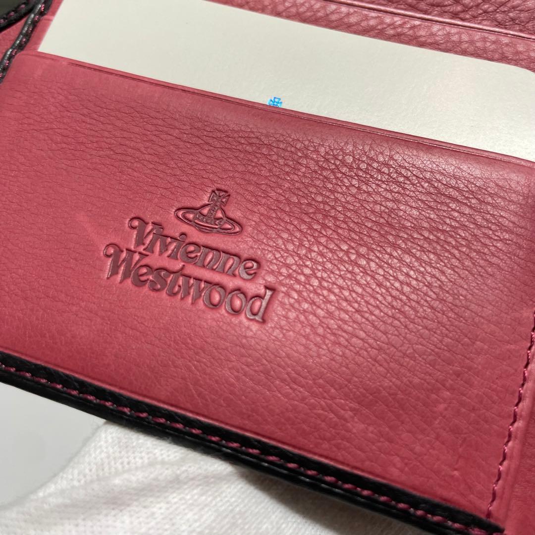 の*あ様 未使用　Vivienne Westwoodレザー製 二つ折り財布 黒