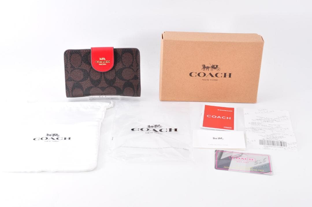 未使用 COACH 二つ折り財布 レザー 女性 付属品：箱,保存袋,カード