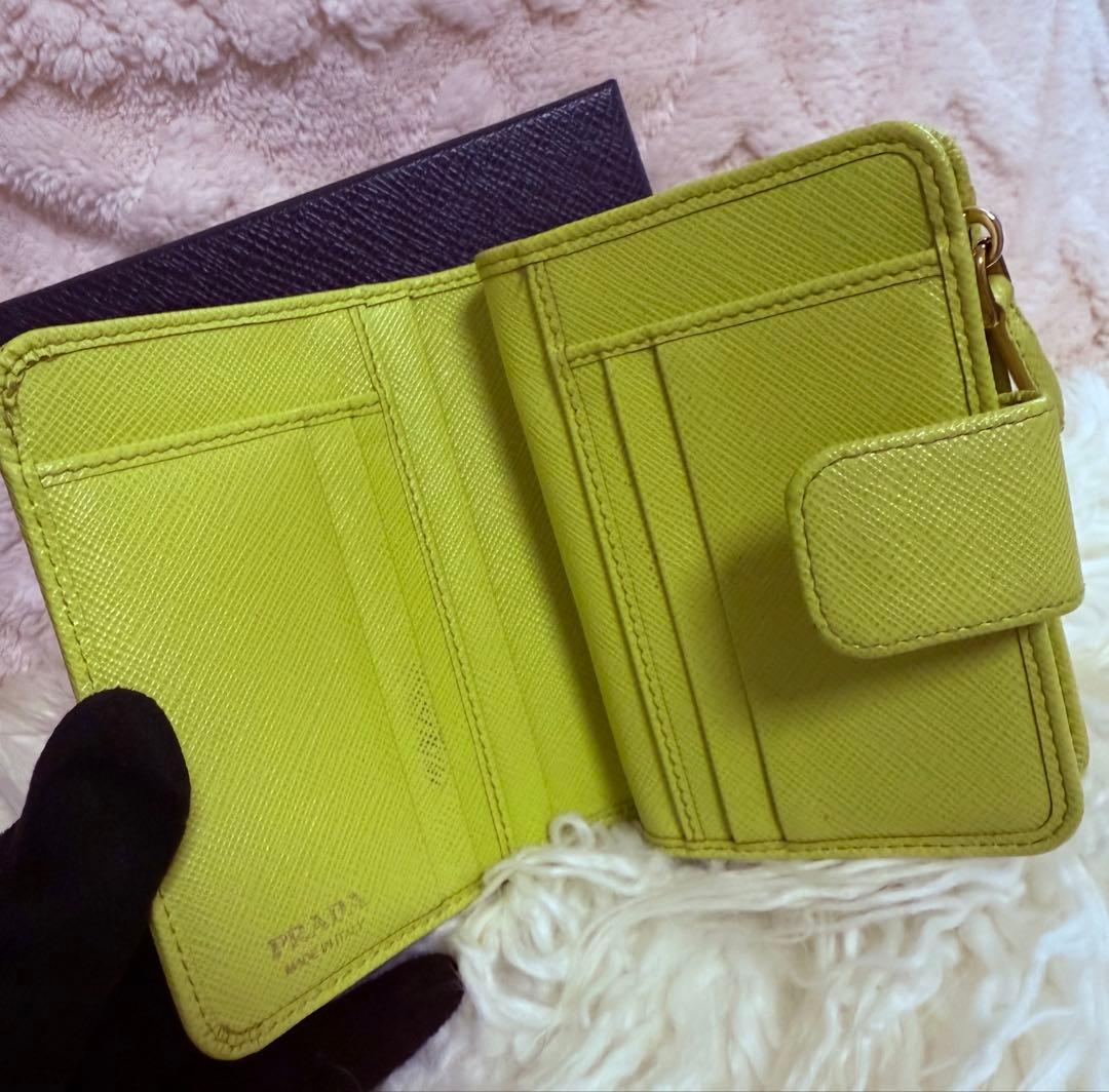 まこちゃん　　PRADA サフィアーノレザー 二つ折り財布 イエロー