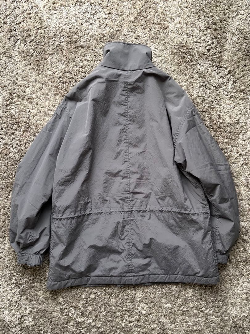 ジャケット・アウター ATON TECHNO COTTON PADDED SHORT