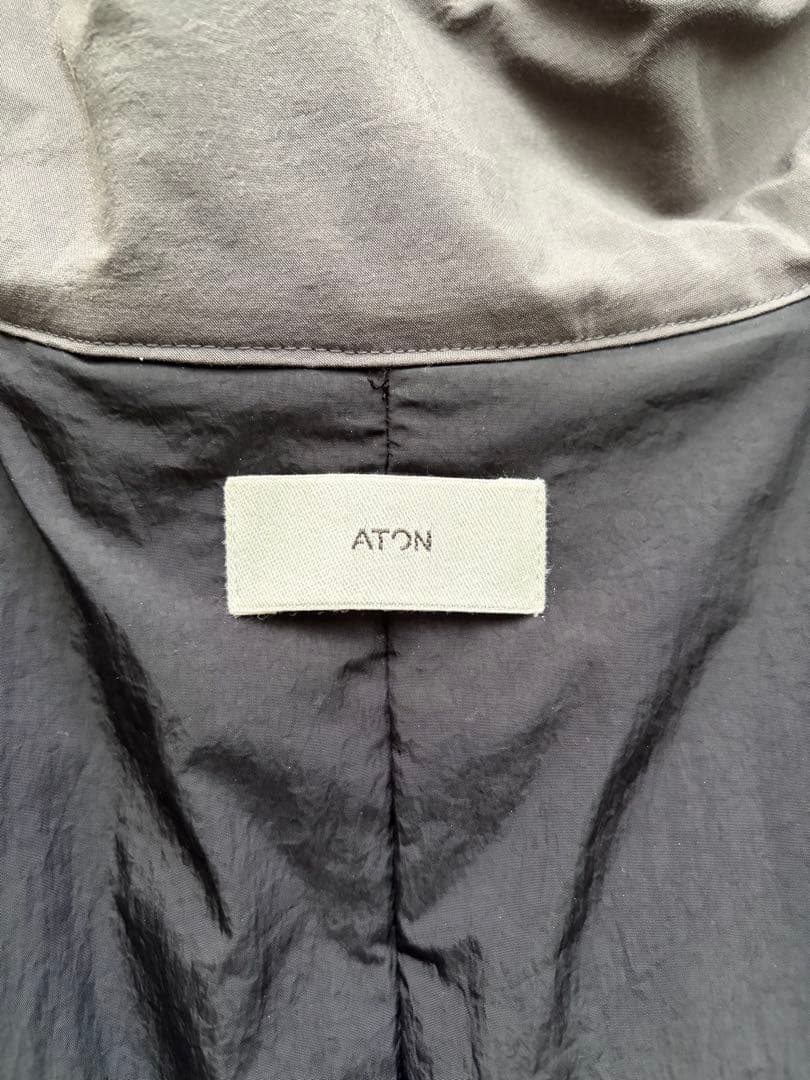 ジャケット・アウター ATON TECHNO COTTON PADDED SHORT