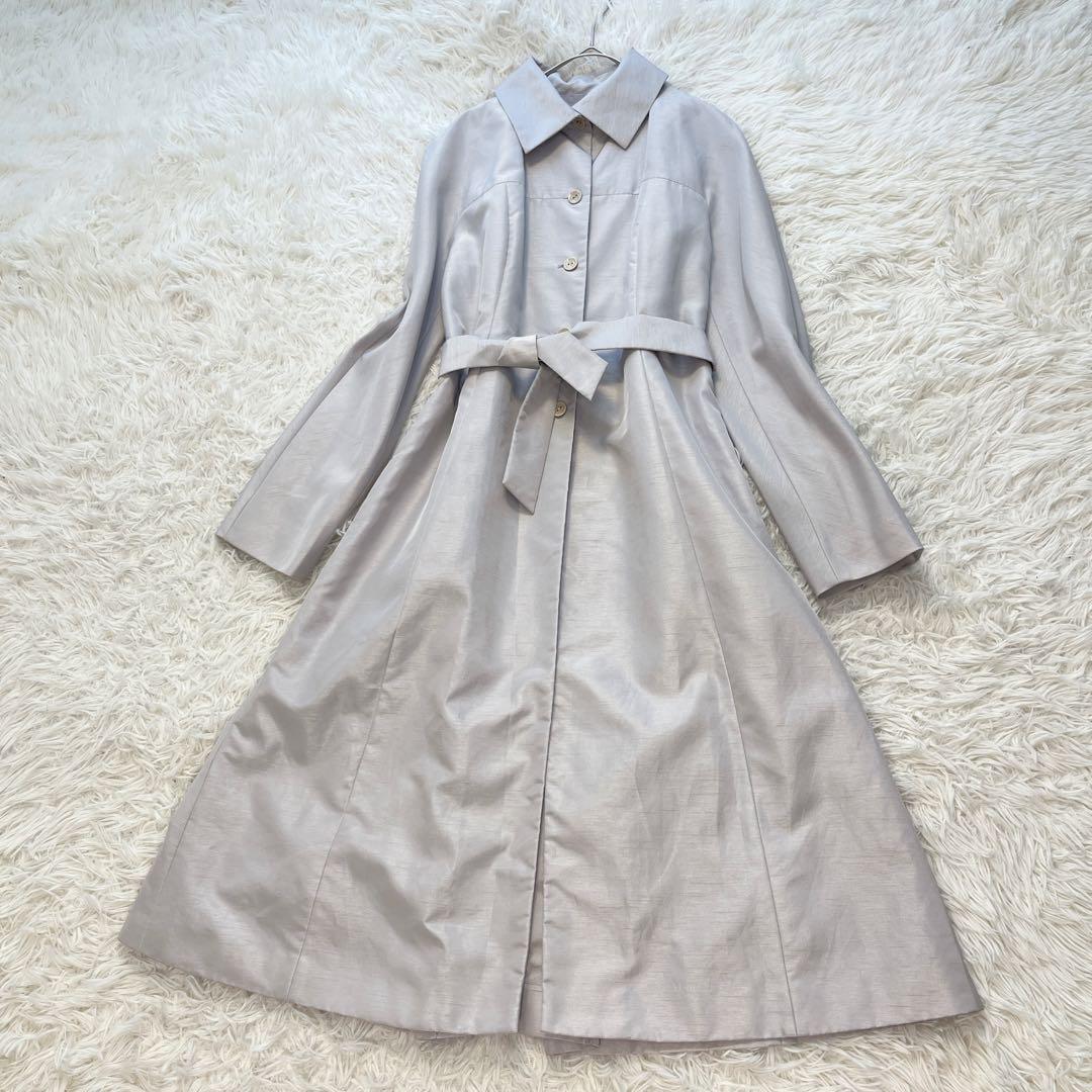 シビラ ベルト付き スプリングコート フレア 光沢シルバー ロング丈