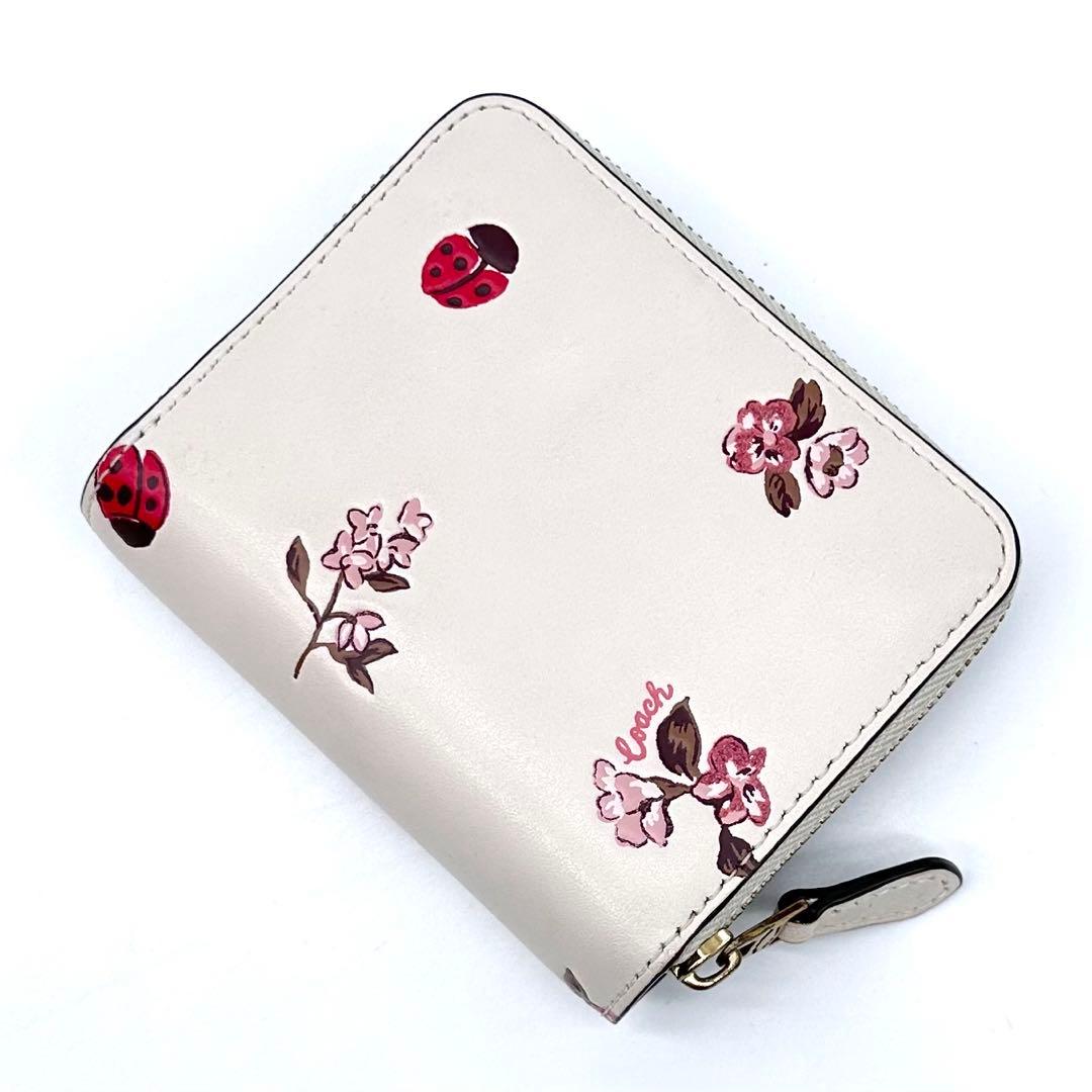 美品✨COACH コーチ 二つ折り財布 レザー てんとう虫 フローラル 日本限定