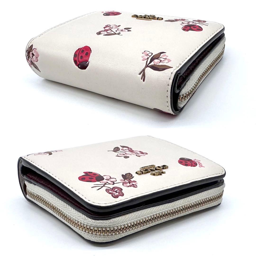 美品✨COACH コーチ 二つ折り財布 レザー てんとう虫 フローラル 日本限定