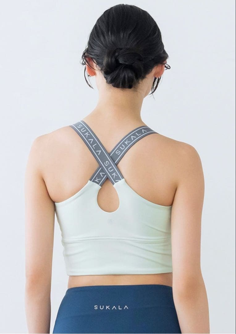 新品タグ付き【SUKALA】バッククロスロゴブラトップ　 Lサイズ