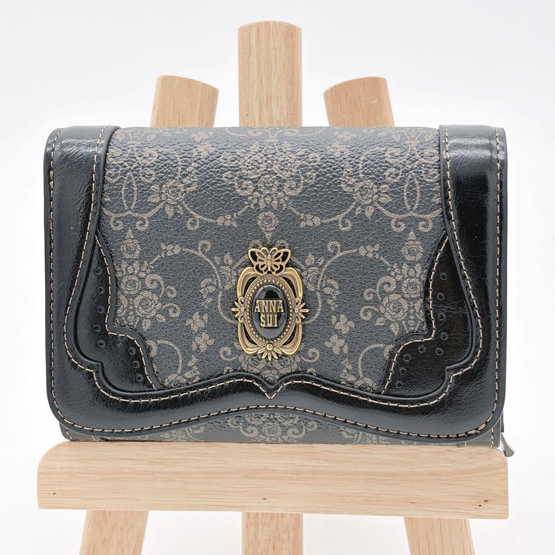 ANNA SUI 二つ折り財布 総柄 蝶モチーフ ファスナー付 ブラック 多収納