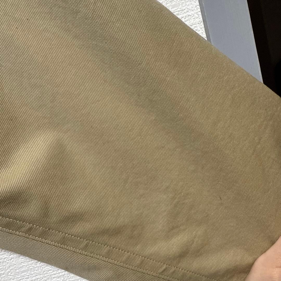 ベージュ ボタン式 トレンチコート