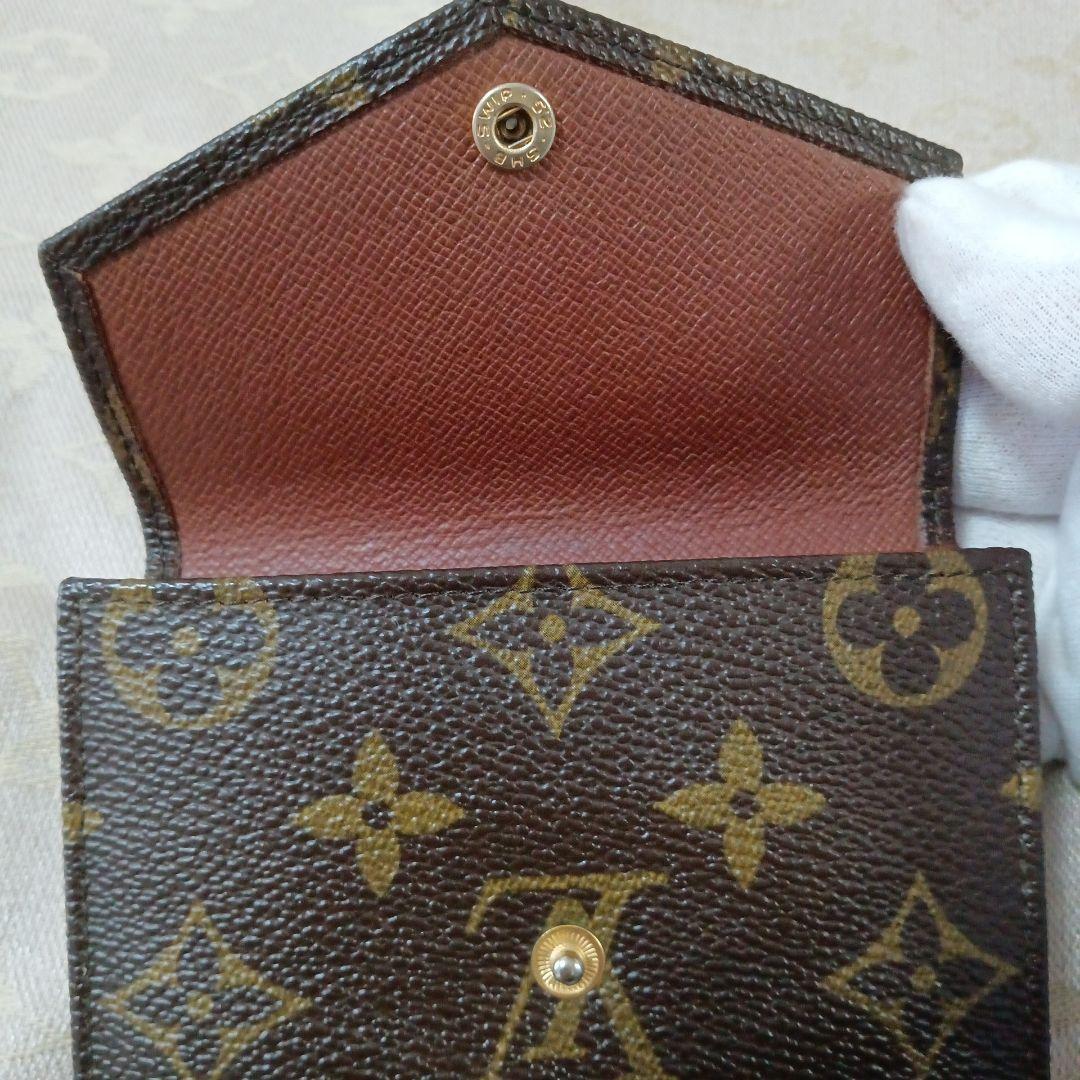 ルイ・ヴィトン。訳あり美品、モノグラム Wホック小銭入れ付き折り財布
