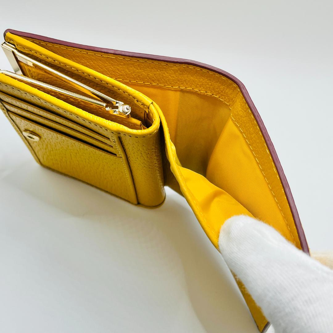 未使用 Vivienne Westwood 新品 折財布 黄色 がま口 シンプル