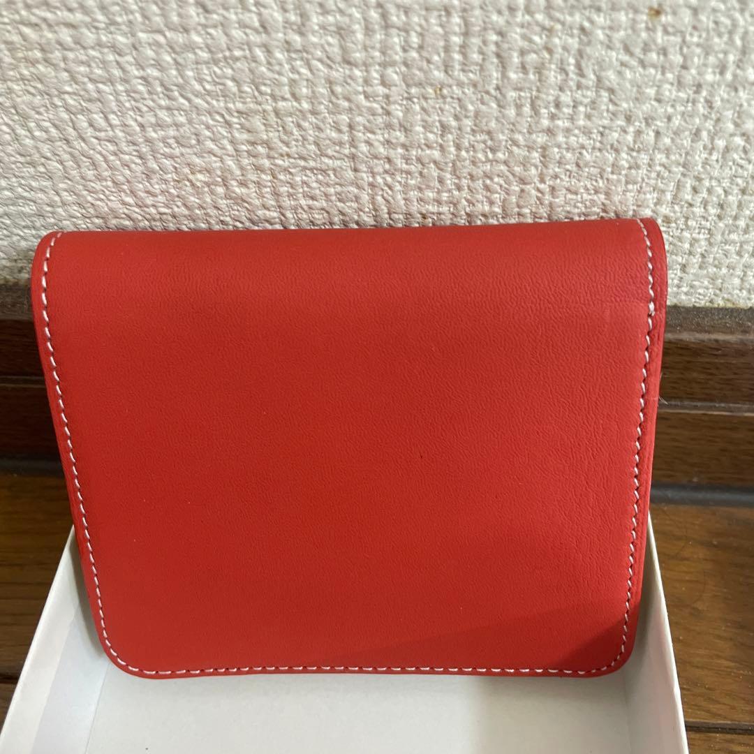 キタムラ　K 赤い二つ折り財布 Kのロゴ付き