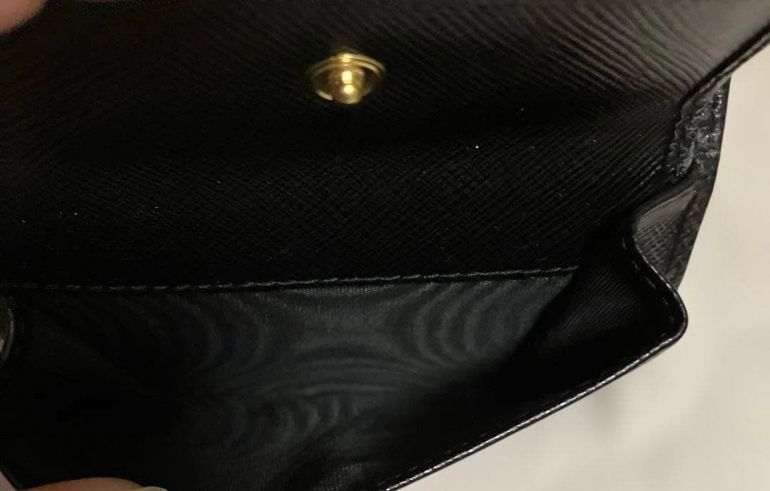 未使用に近い PRADA プラダ 二つ折り財布 サフィアーノレザー