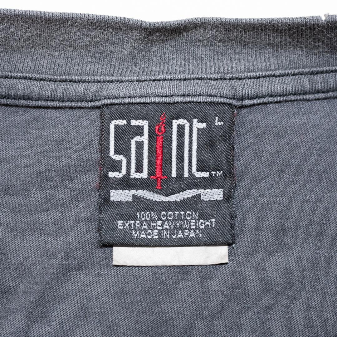 SAINT Mxxxxxx ブルーフェイスキャラクター プリントTシャツ