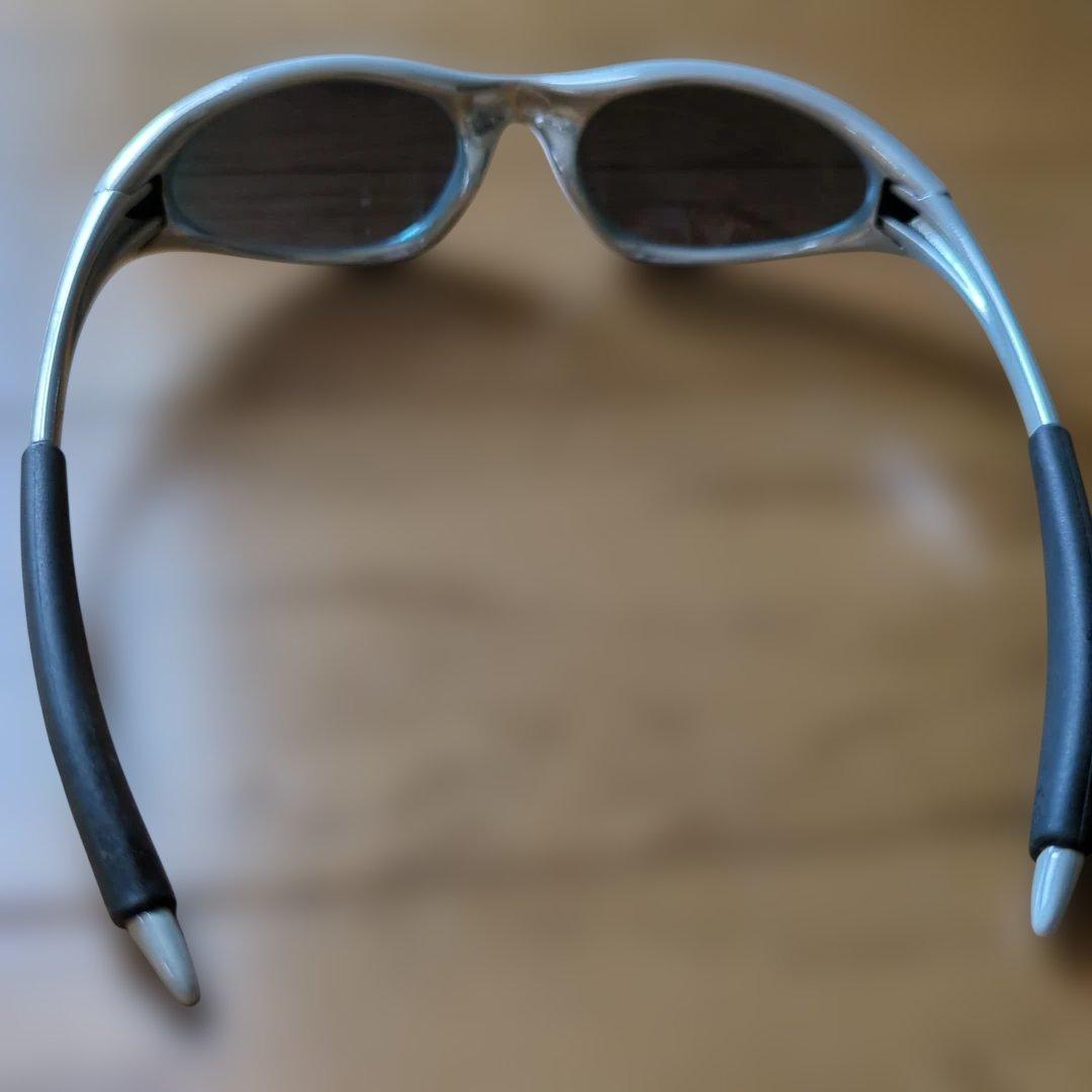 Oakley スポーツサングラス レッドレンズ シルバー