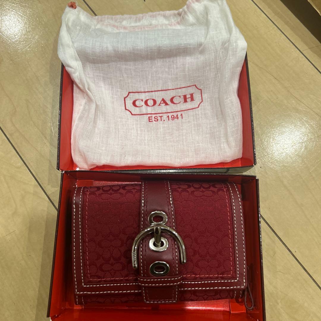 COACH 赤い二つ折り財布 折りたたみ財布 シグネチャー