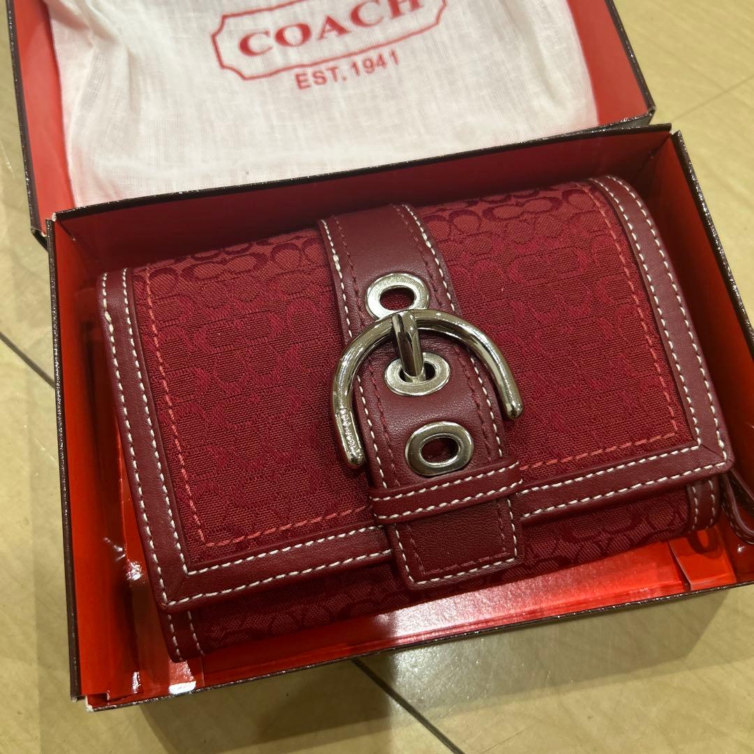 COACH 赤い二つ折り財布 折りたたみ財布 シグネチャー