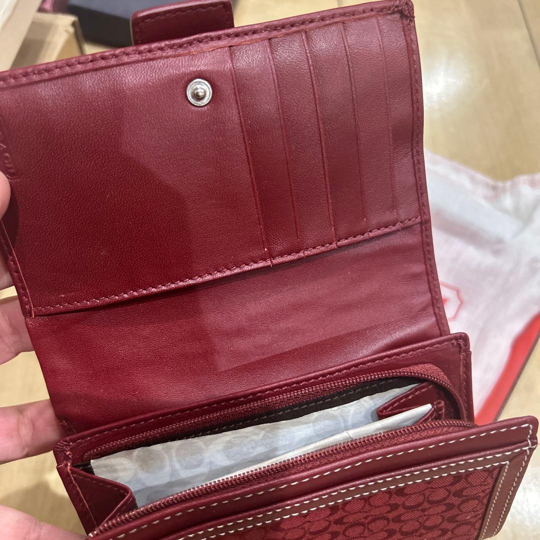 COACH 赤い二つ折り財布 折りたたみ財布 シグネチャー