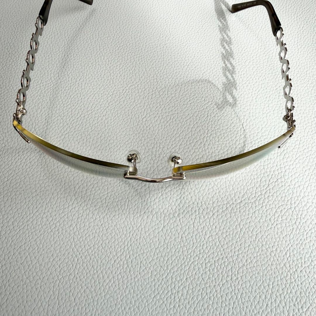 salvatore ferragamoガンチーニ リムレス サングラス