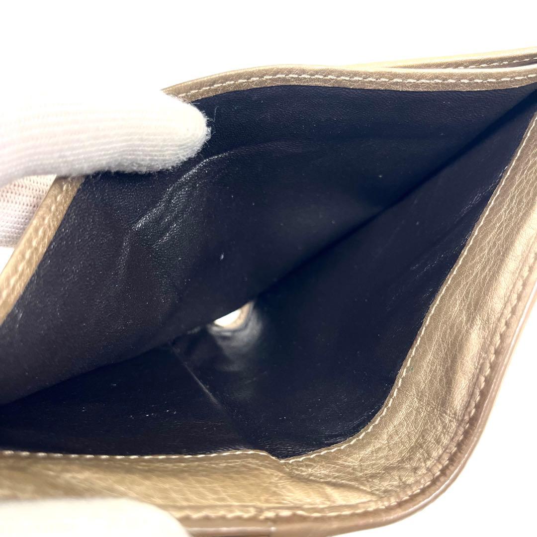 グッチ　折り財布　GGキャンバス　リボン　ロゴ総柄　バンブータッセル　レザー