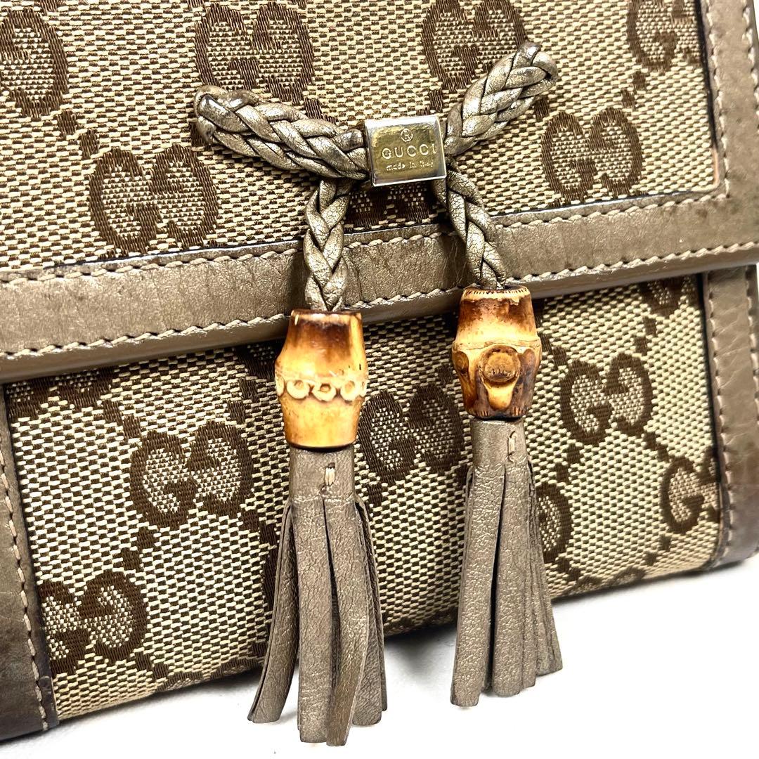 グッチ　折り財布　GGキャンバス　リボン　ロゴ総柄　バンブータッセル　レザー