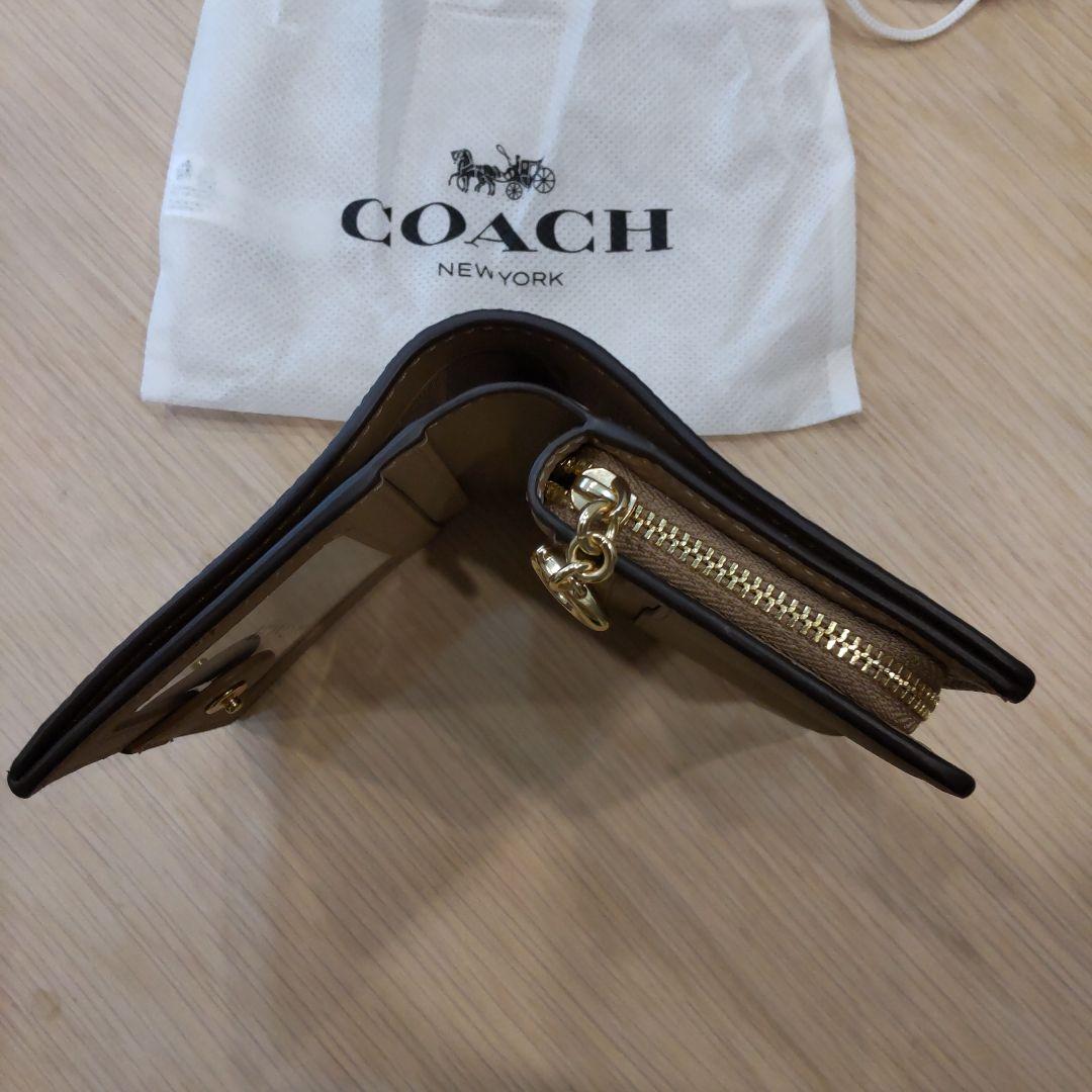 専用です！　お値下げしました。新品未使用！COACH ベージュ系 二つ折り財布