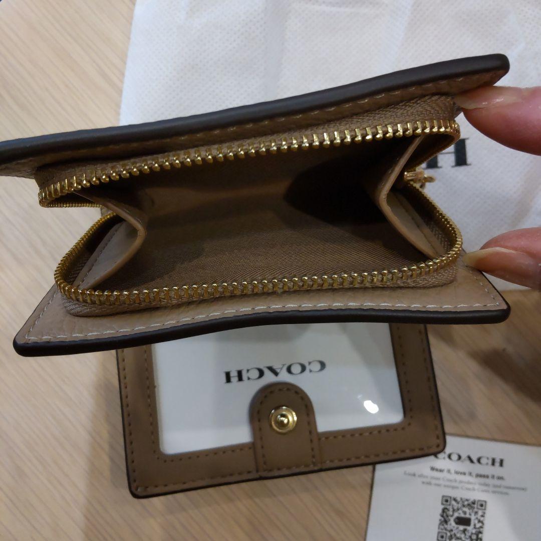 専用です！　お値下げしました。新品未使用！COACH ベージュ系 二つ折り財布