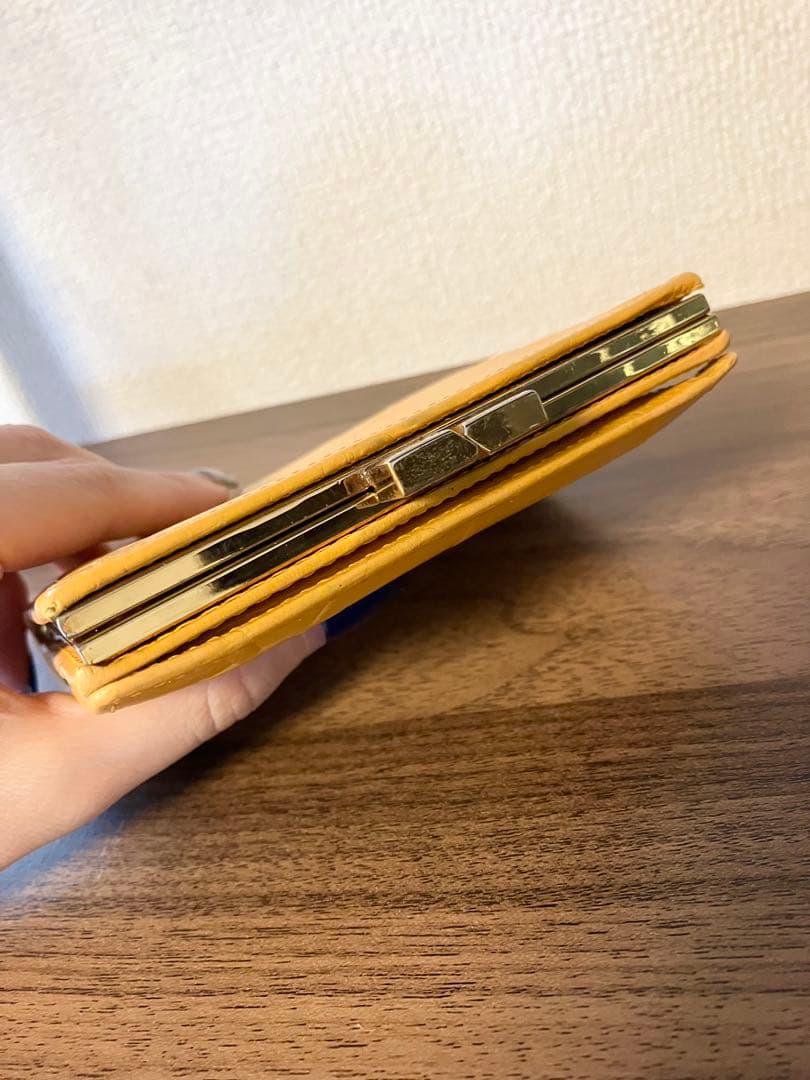 レアYves Saint Laurent サンローラン　イエロー　二つ折り財布