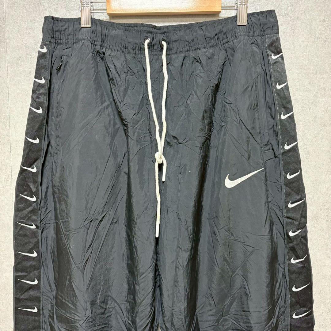 NIKE XL スウッシュ総柄 ナイロンパンツ ブラック　XL