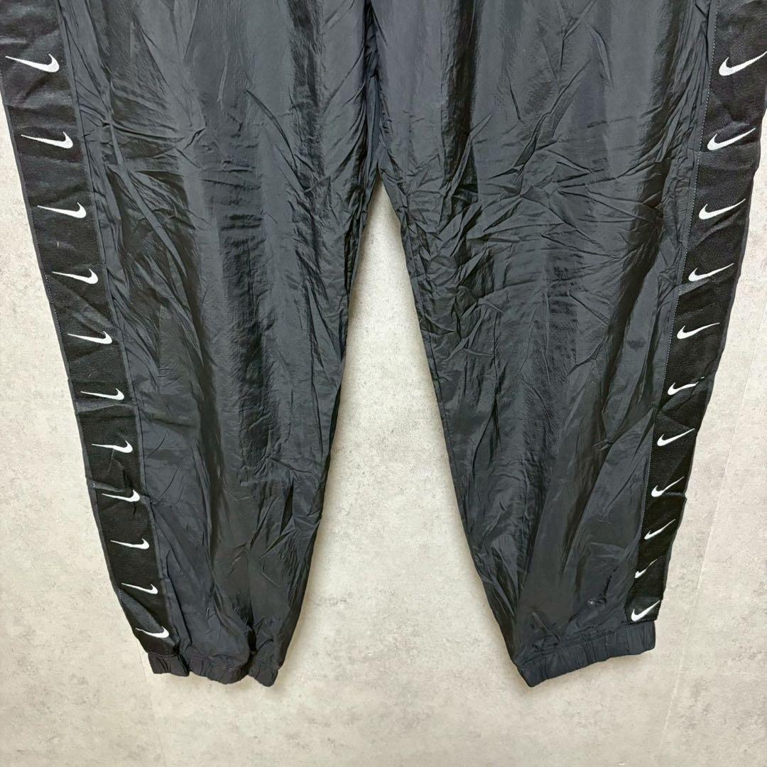 NIKE XL スウッシュ総柄 ナイロンパンツ ブラック　XL