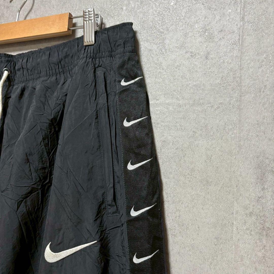 NIKE XL スウッシュ総柄 ナイロンパンツ ブラック　XL