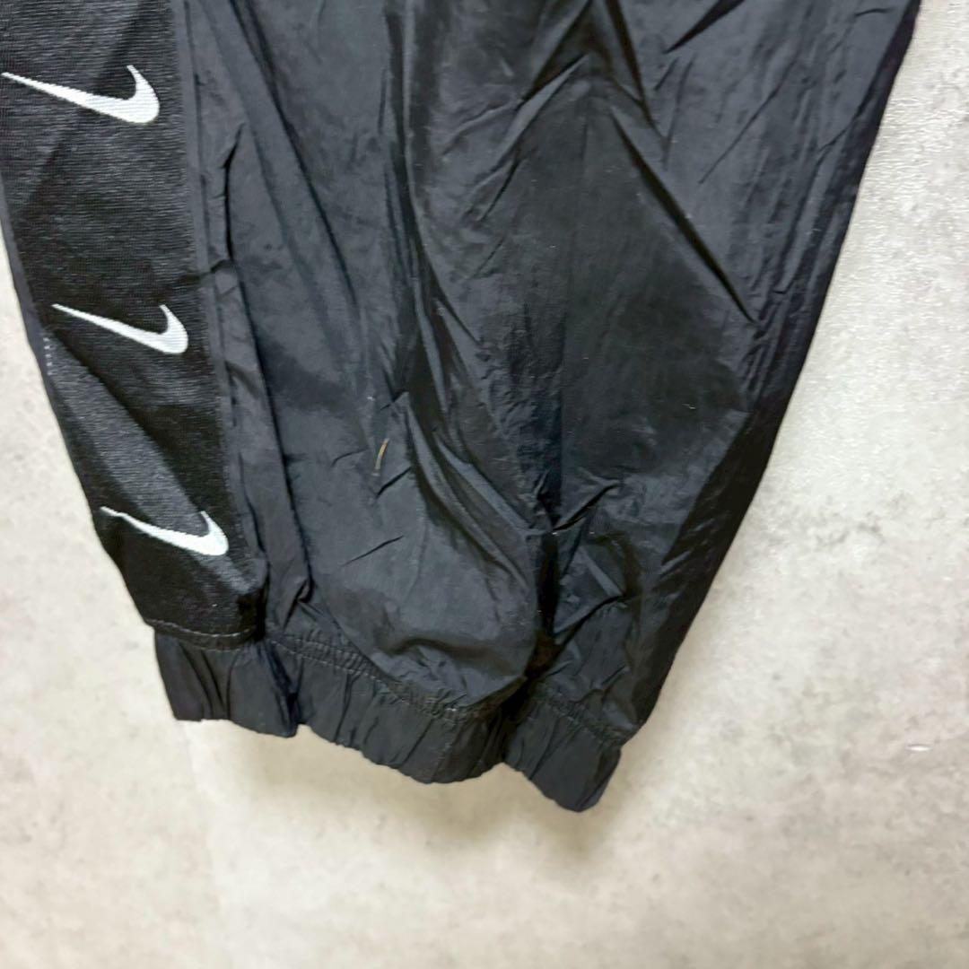 NIKE XL スウッシュ総柄 ナイロンパンツ ブラック　XL