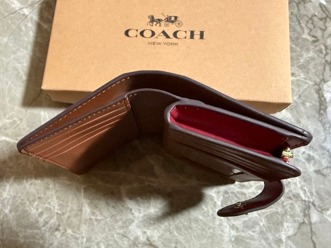 COACH 花柄 二つ折り財布
