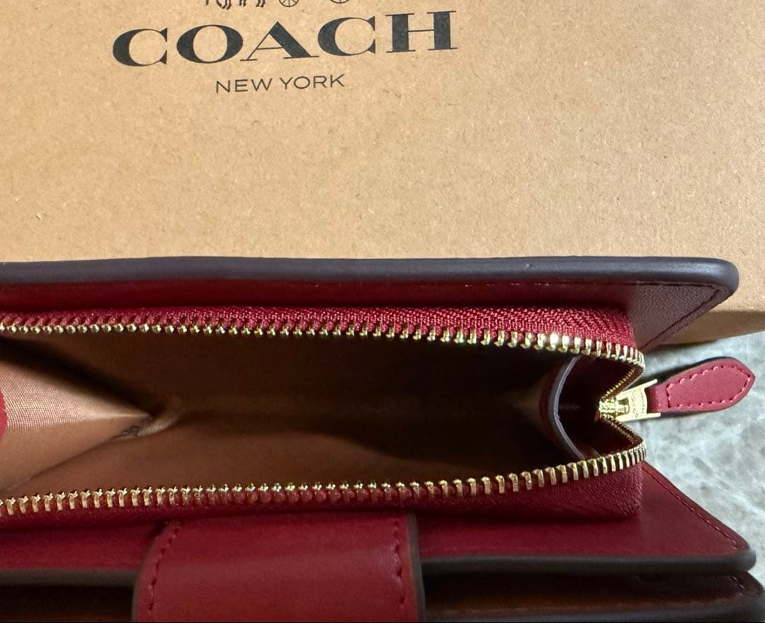 COACH 花柄 二つ折り財布
