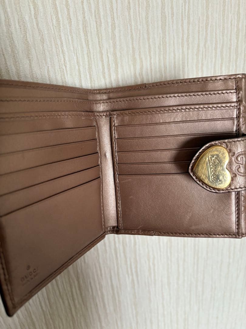 GUCCI グッチ　GG 二つ折り財布 シマレザー　ピンク