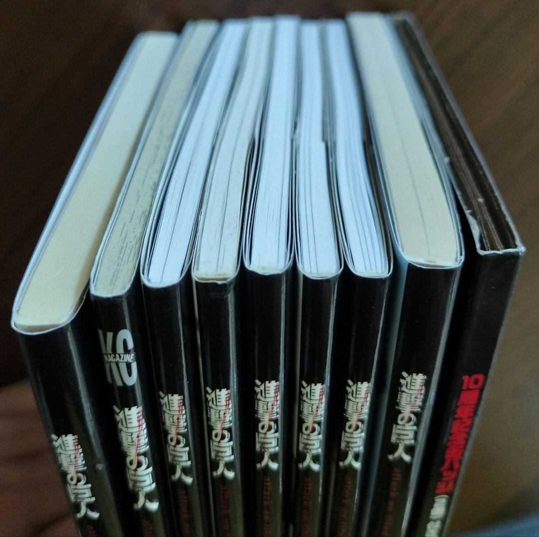 進撃の巨人 小冊子8冊&28巻缶バッチ未使用付！！Short Stories全巻