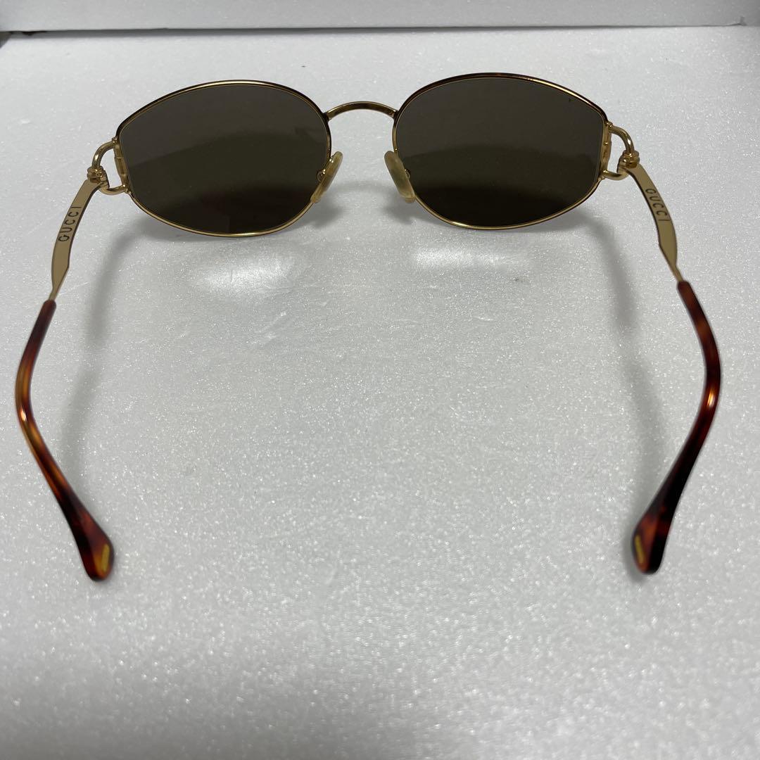 GUCCI ゴールドオーバルフレーム サングラス