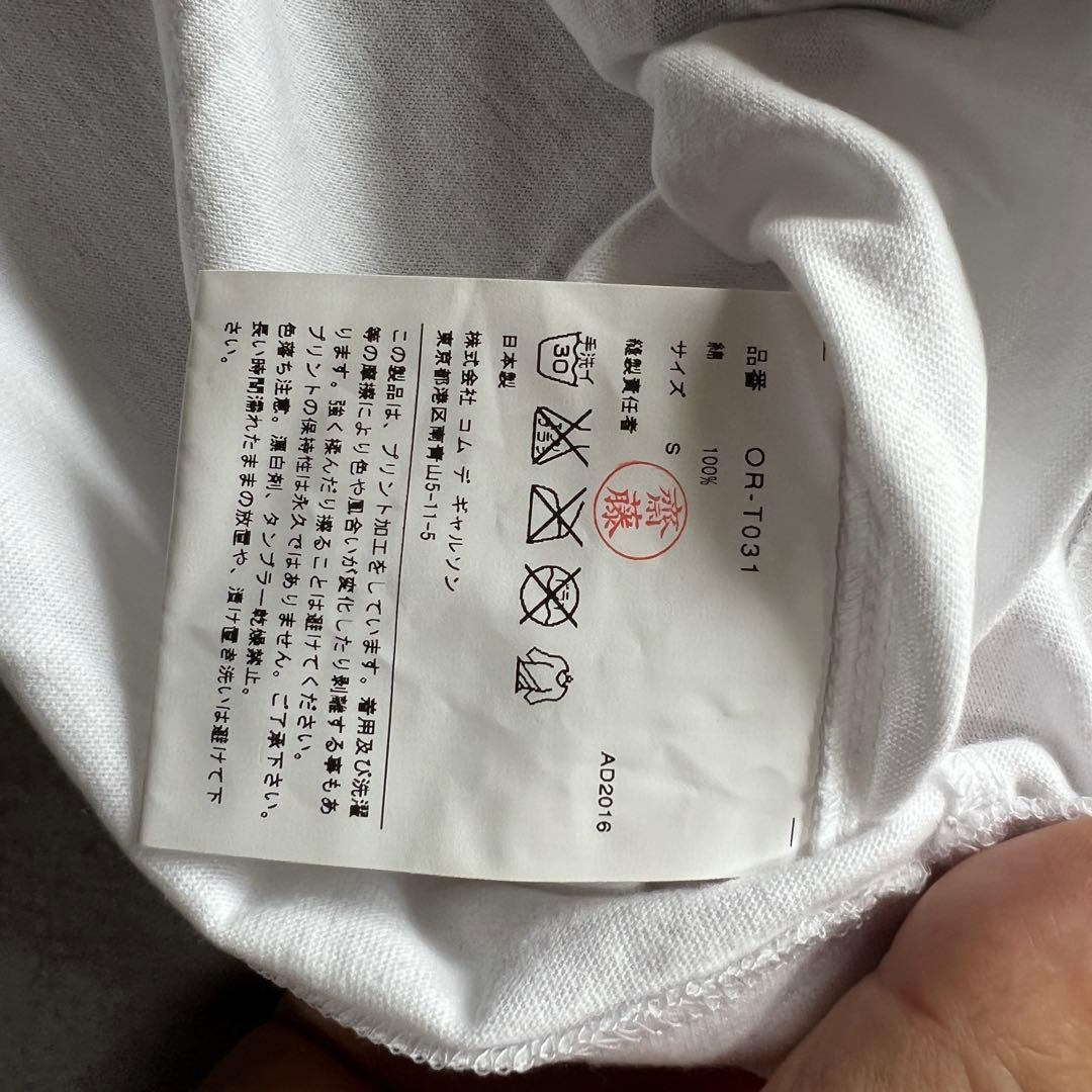 トップス HOLIDAY emoji COMME des GARCONS