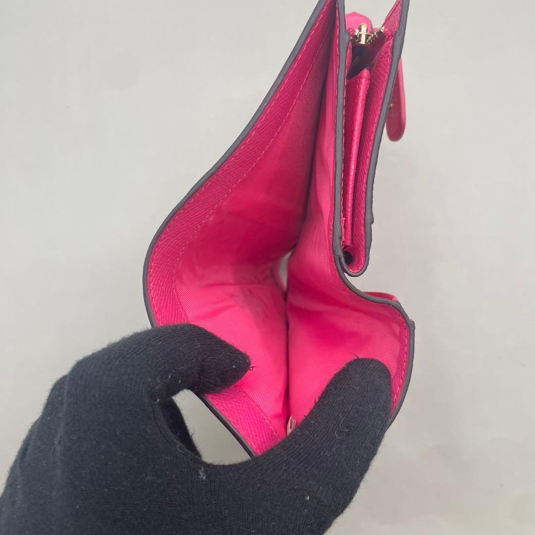 極美品✨️コーチ 二つ折り財布 フラップ シグネチャー PVC レザー 茶 ピンク