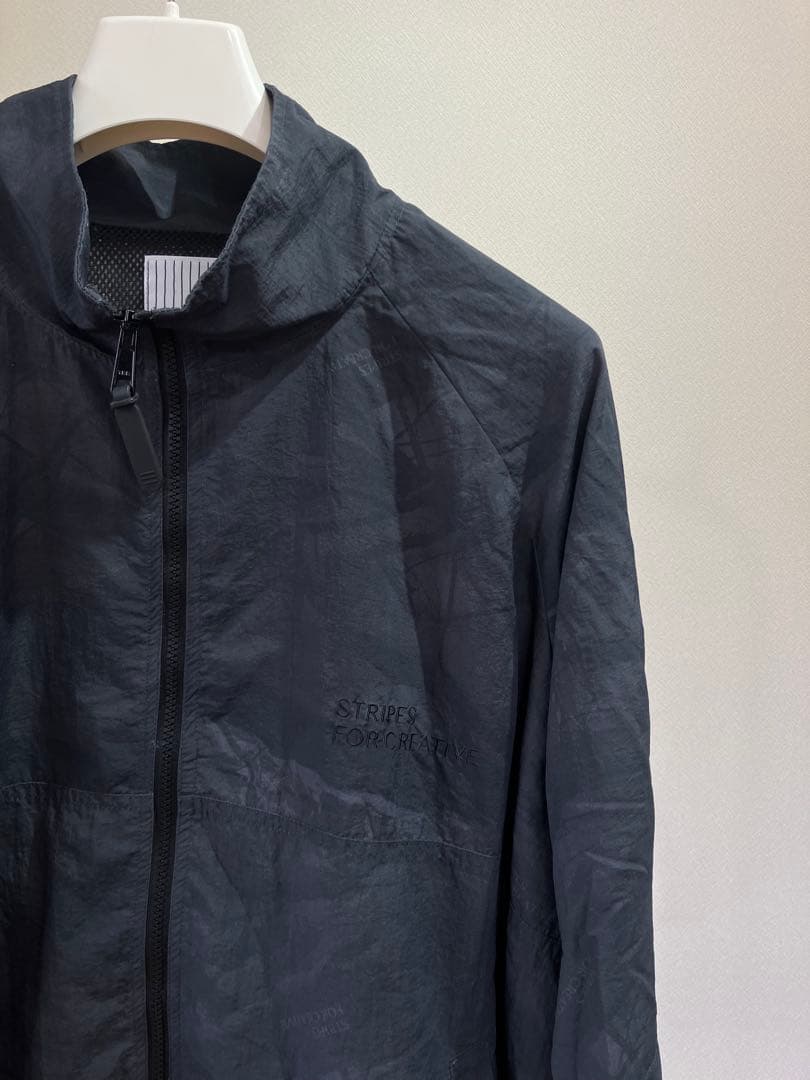 ジャケット・アウター S.F.C WINDBREAKER JACKET (REAL TREE CAMO