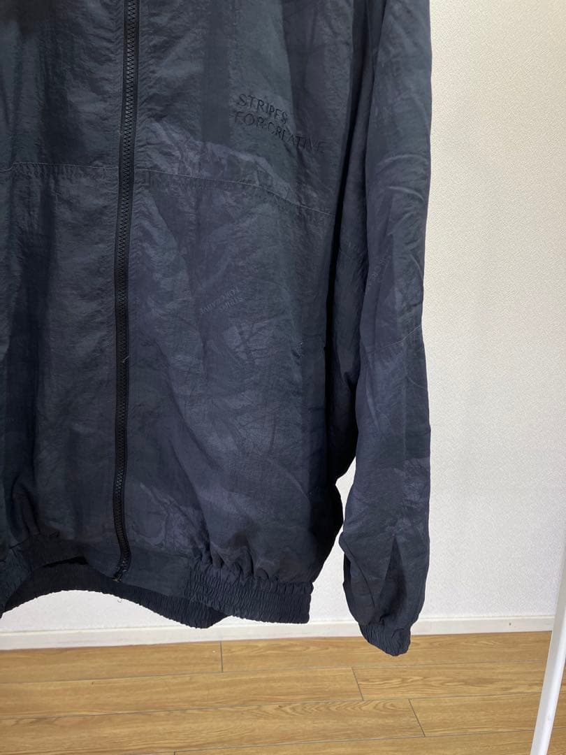 ジャケット・アウター S.F.C WINDBREAKER JACKET (REAL TREE CAMO