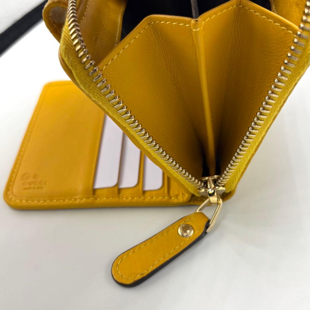 【美品】GUCCI グッチ 二つ折り財布 シグネチャー イエローレザーレディース