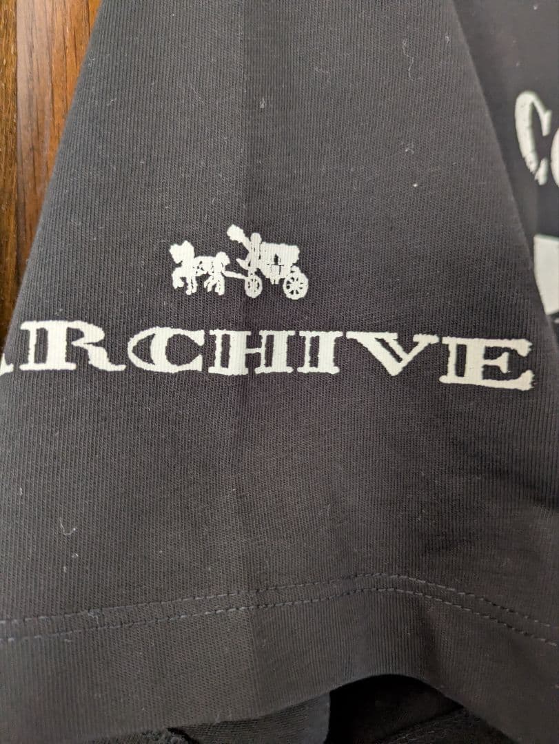 COACH 恐竜プリント Tシャツ ブラック