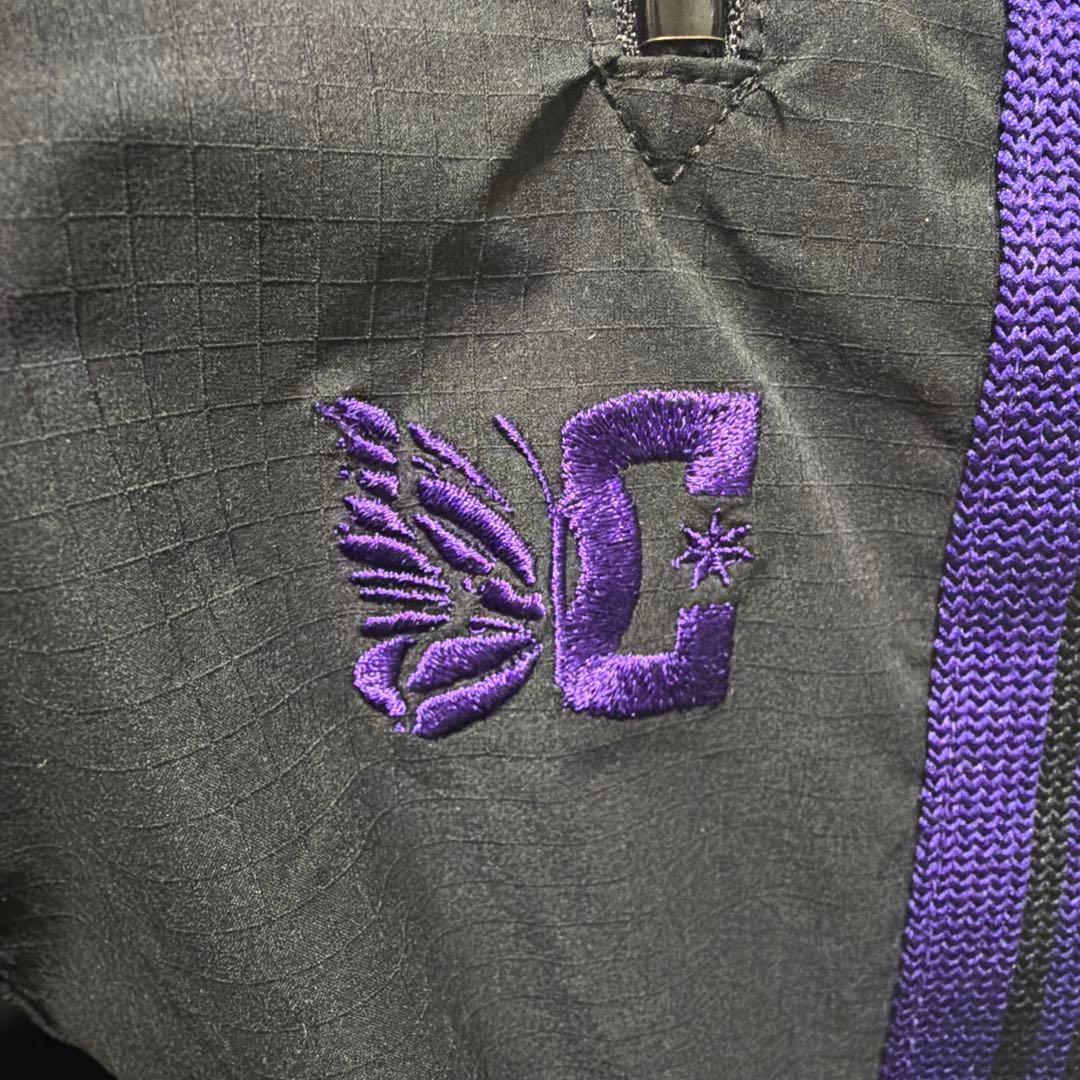 ニードルス×DCシューズ　黒紫ストライプトラックパンツ