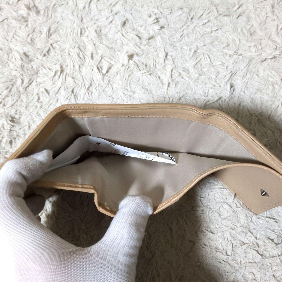 メゾンマルジェラ 日本タグ グラムスラム カレンダー 三つ折り財布