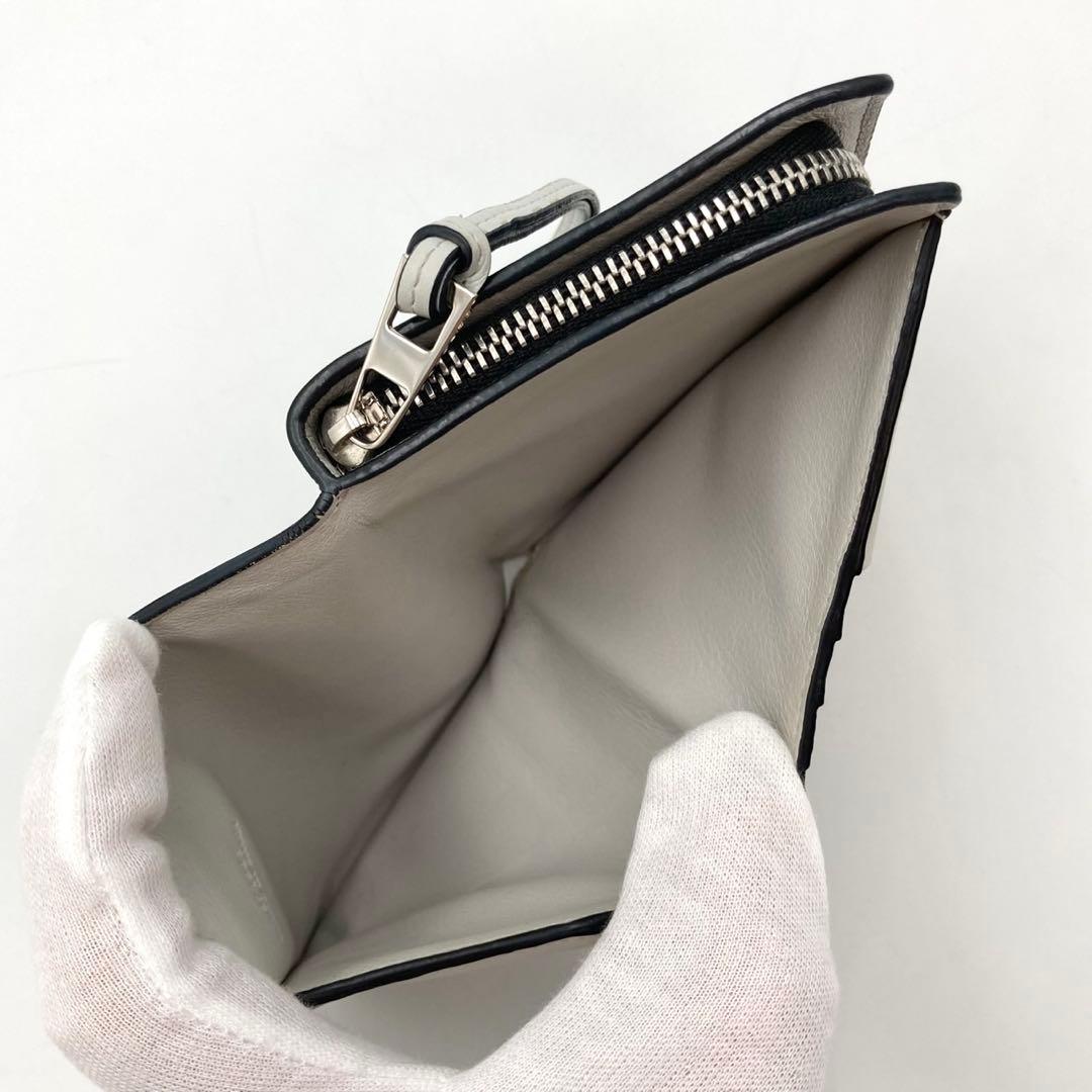 たなたな✨LOEWE 二つ折り財布 アナグラム レザー 黒 パンチングロゴ