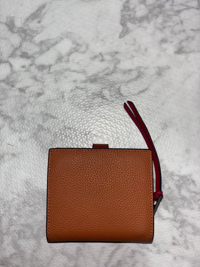 売り尽くし。LOEWE 二つ折り財布 オレンジ/レッド