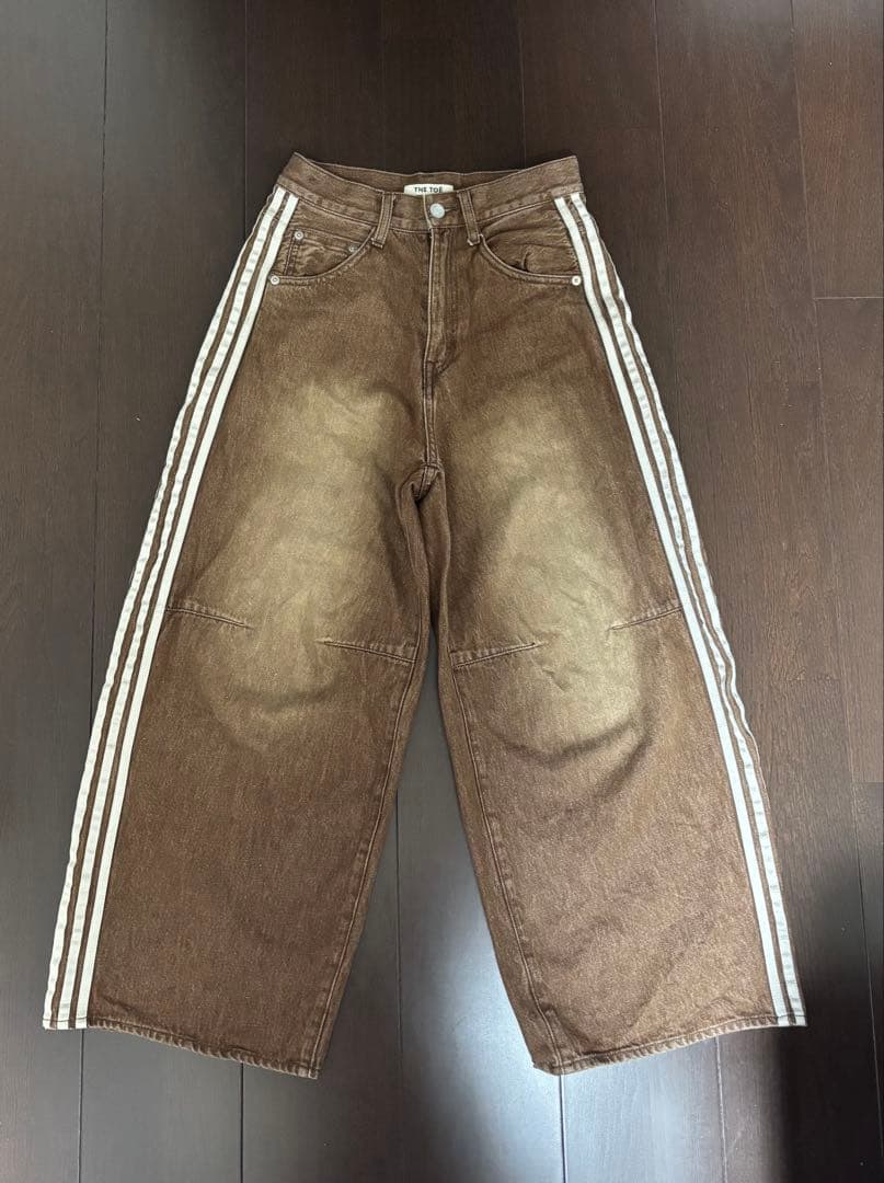THE TOÉ EMIRATES TRACK DENIM PANTS