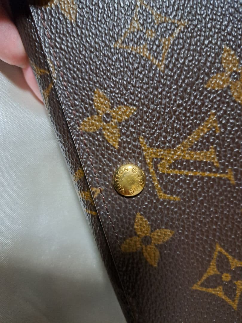 楽*み様 Louis Vuitton モノグラム 二つ折り財布