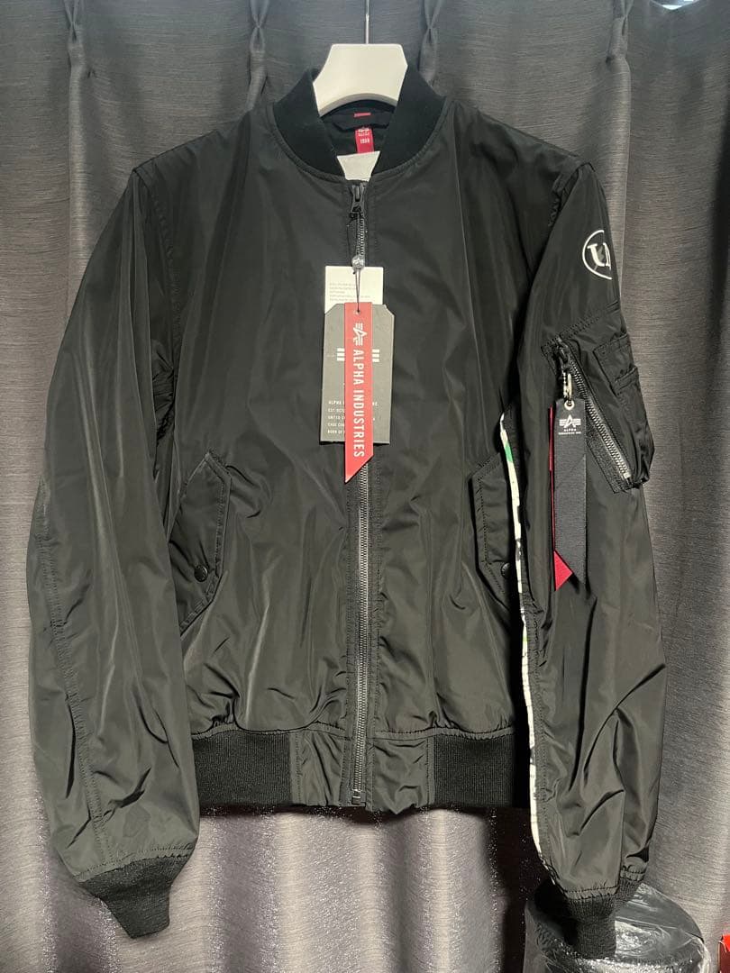 ジャケット・アウター uniform experiment ASGER JORN ALPHA MA-1