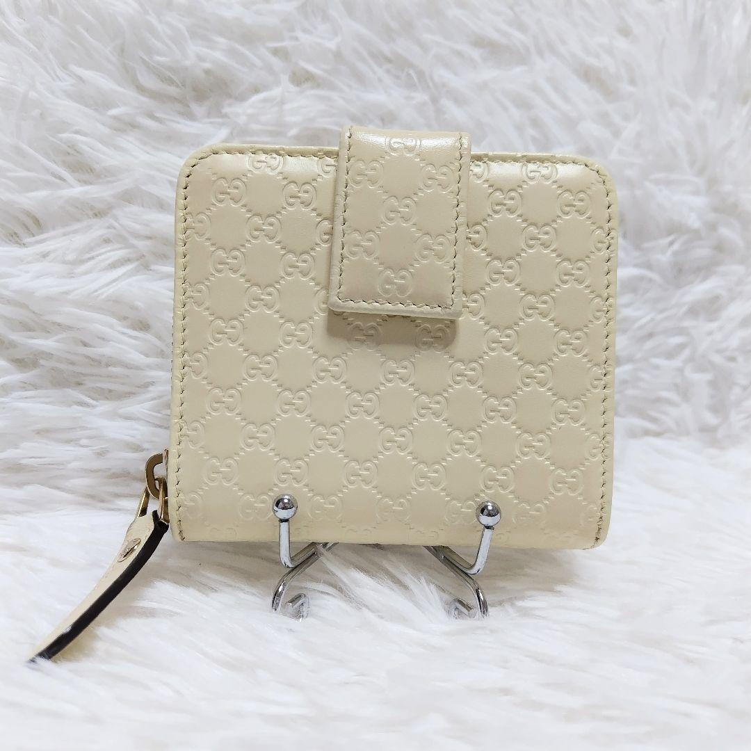 美品✨グッチ◇コンパクトタブ二つ折り財布　ゴールド金具　マイクロシマ白クリーム