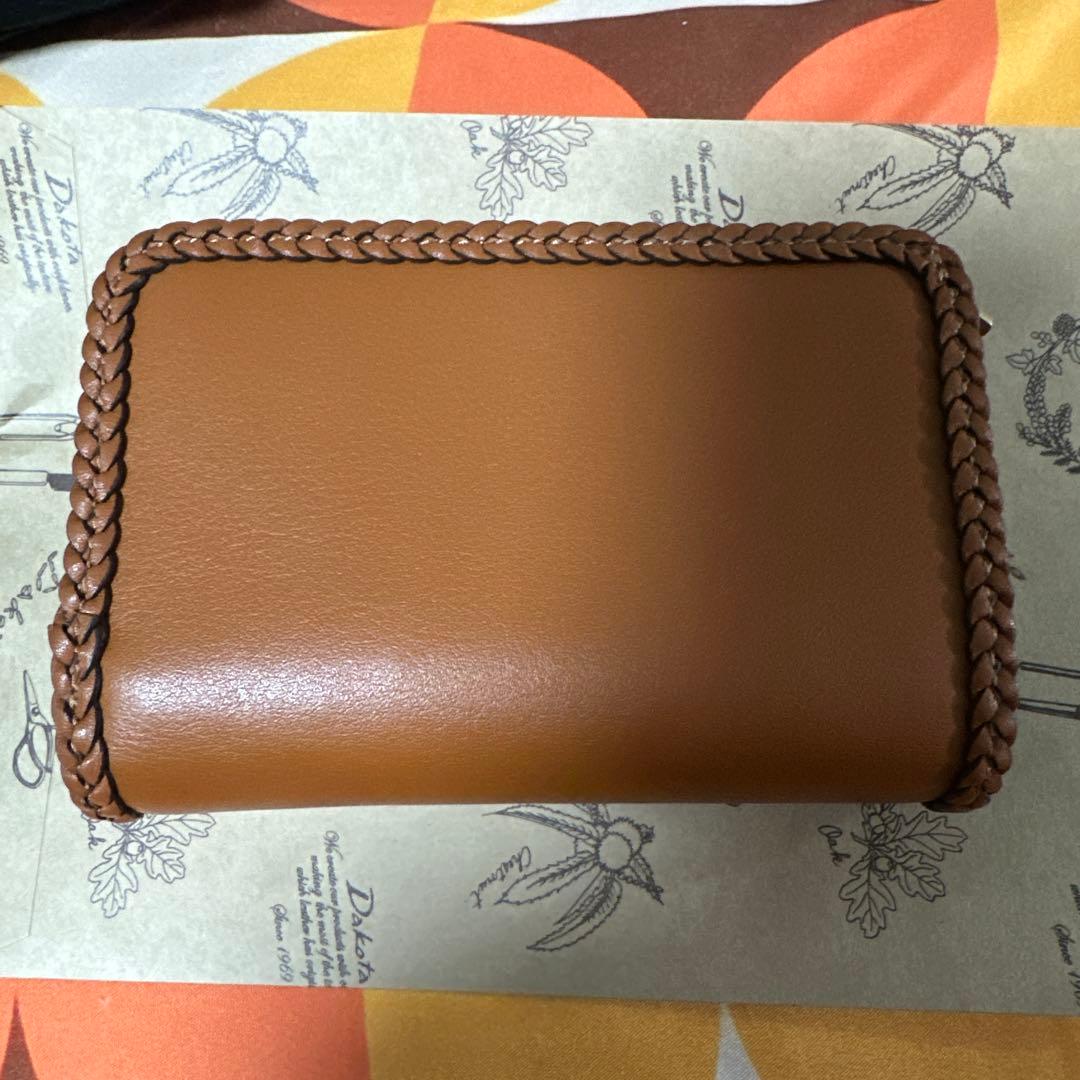 COACH ブラウン 二つ折り財布 編み込みデザイン